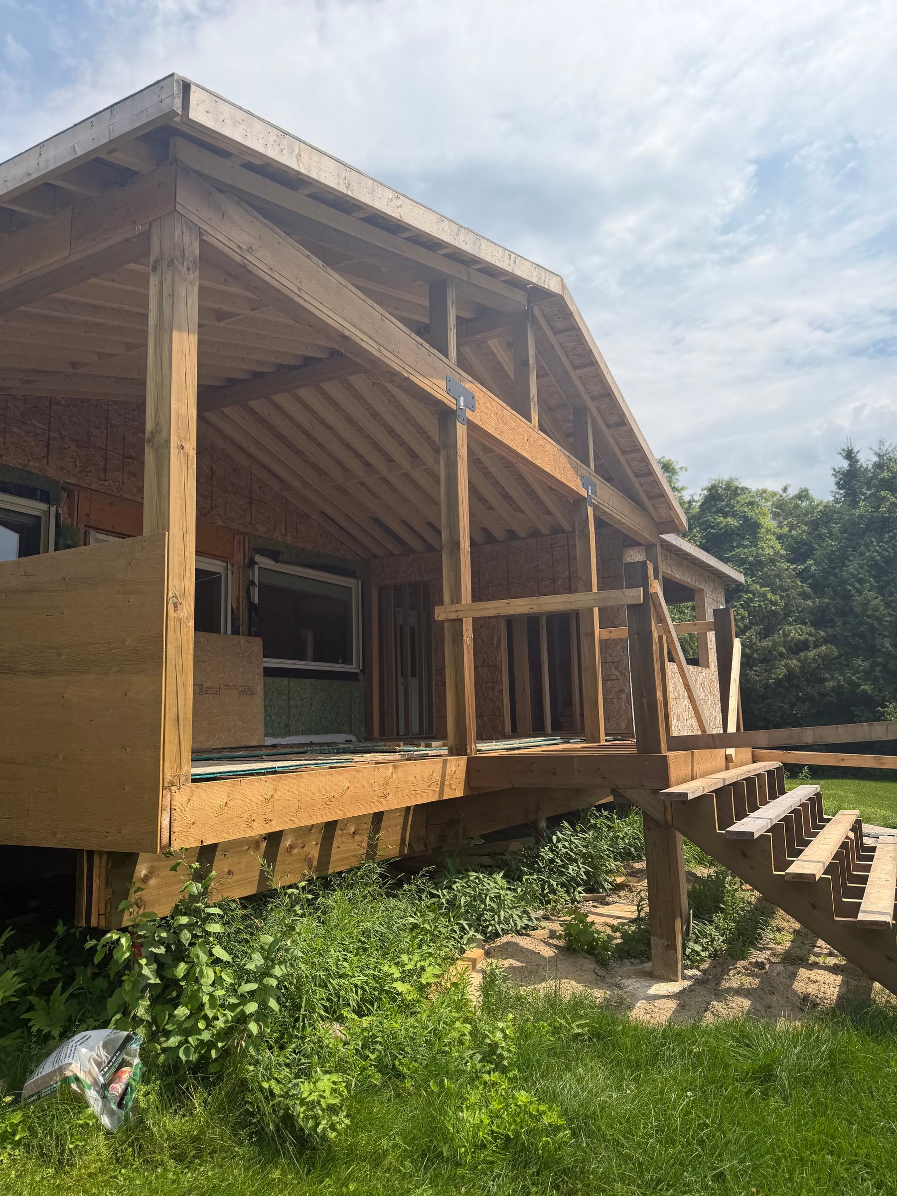 New covered porch structure after the rebuild