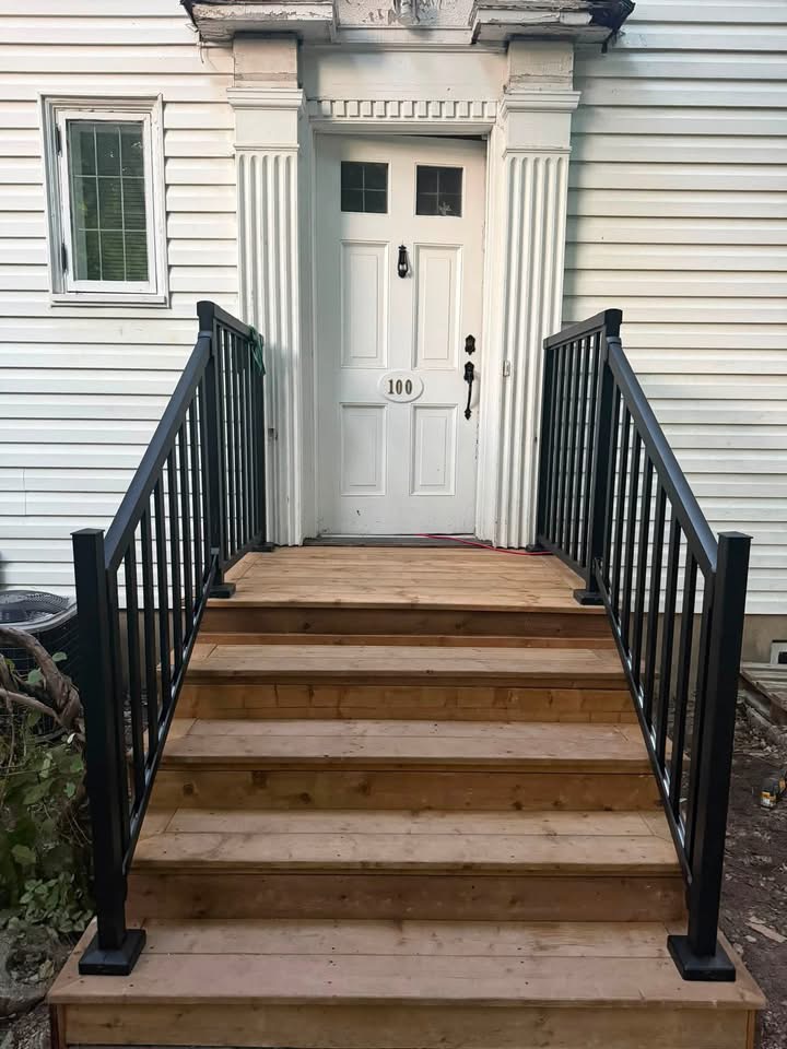New front steps and black railings